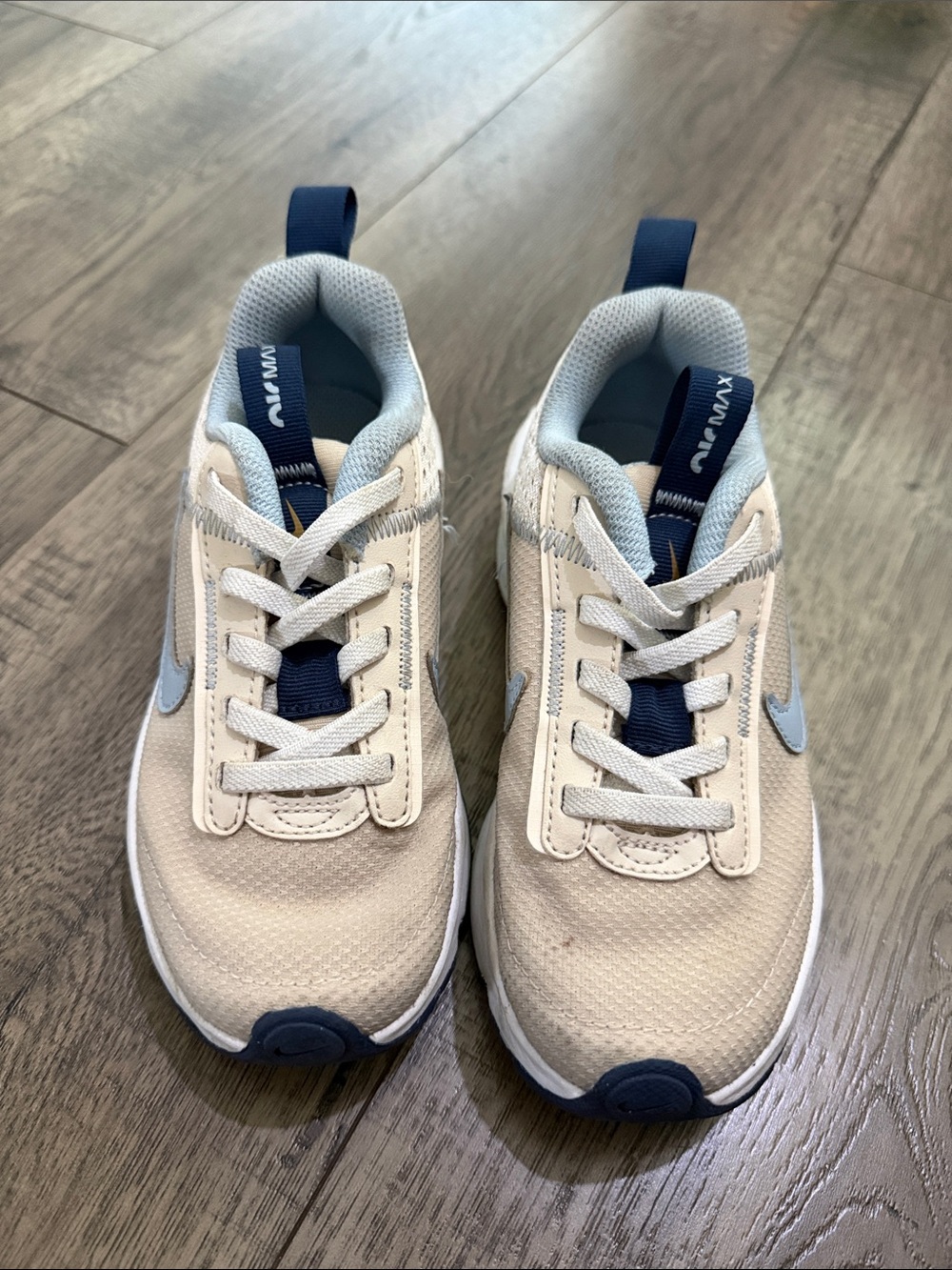 Kids White and Blue Nike sneakers
